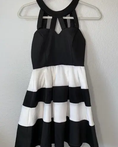 Crystal Doll black and white halter dress with cutouts