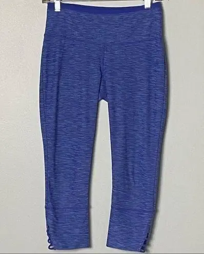prAna indigo/royal blue “Tori” yoga capris with cut-out hems in size Small. EUC