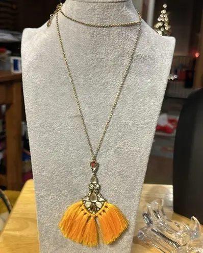 Janice and Jasper tassel necklace has bling on it. It’s very beautiful.
