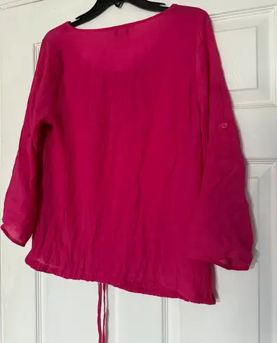 Christopher & Banks long sleeve blouse is a size Medium.