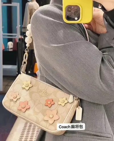 Nolita 19 In Signature Canvas With Floral Applique ch619