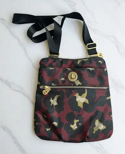 BAGGALINI Burgundy Travel Leopard Print Crossbody Bag