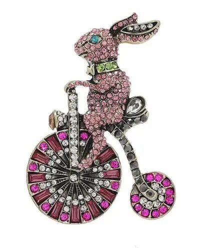 Brooch rabbit, riding an old