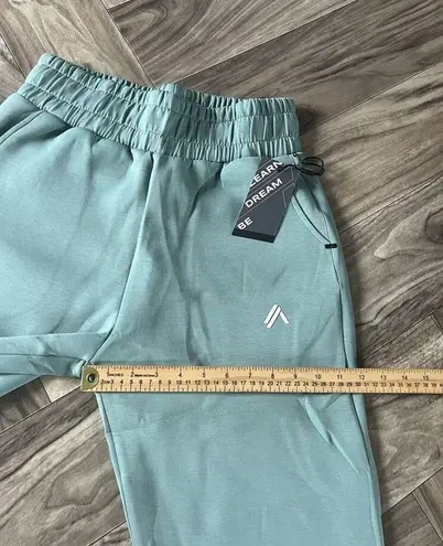 Alphalete  WOMEN'S ELMTS RELAXED CUFFED JOGGER - Teal , Size Medium