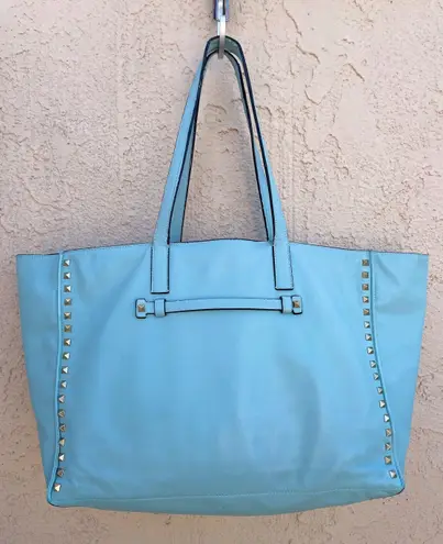 Valentino Garavani Valentino Rockstud medium light blue soft smooth leather shopping tote bag