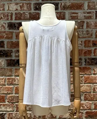 Romeo + Juliet Couture NWT  hi-low ruffle edge white crop top with cords / size M