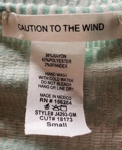 Caution to the Wind  Faux Wrap Top