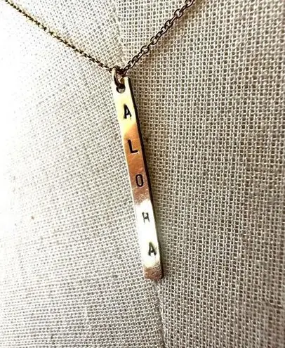 The Bar Gold tone aloha pendant necklace