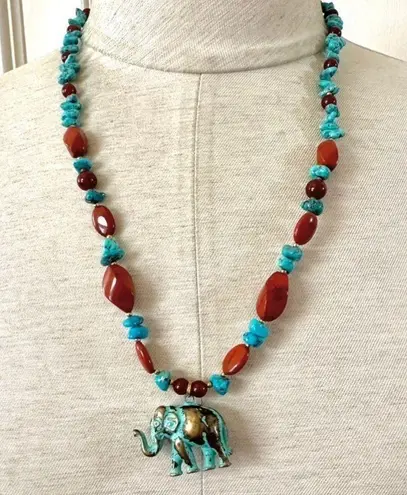 Brass elephant pendant necklace with carnelian, turquoise and red jasper beads