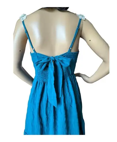 Daisy tiered smocked open back with bow high low dress size medium Blue - Image 9