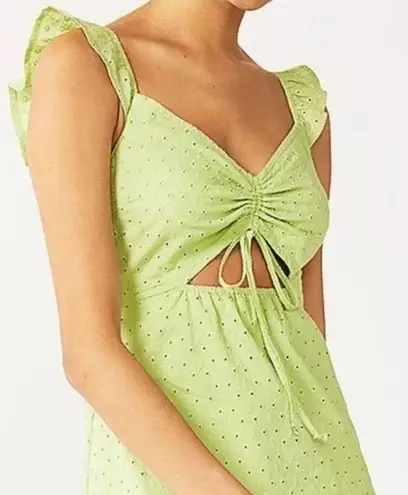 Live to be spoiled like green eyelet smocked cut out ruffle cinched mini dress