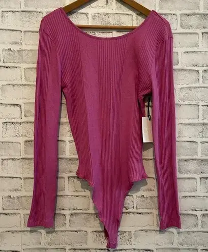 NWT! Urban Rebel pink long sleeve bodysuit criss