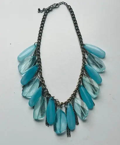 Style and Grace
Mid Century Modern Gold Tone Necklace With Tons of Lucite Drops Blue