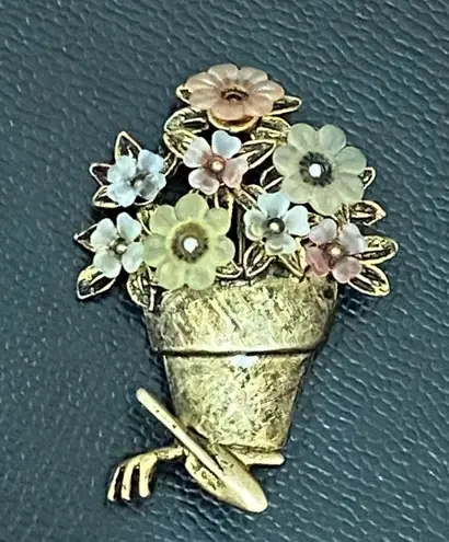 LIA Signed Pot of Flowers with Garden Tools Gold