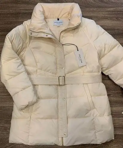 Cole Haan  NWT Puffer Coat.  Size: XL.  Gold tone zippers and buttons.  Belted