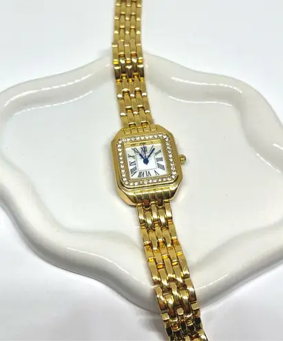 Gold vintage style timeless gold watch