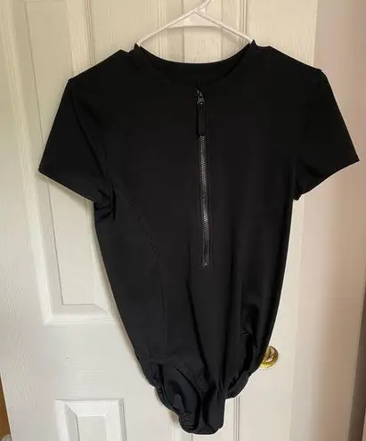 Zella  Black Short Sleeved Quarter Zip Body Suit