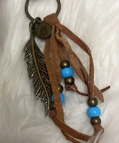 The Sak Esperado Leather Purse with Hippie keychain “Happy & Free”