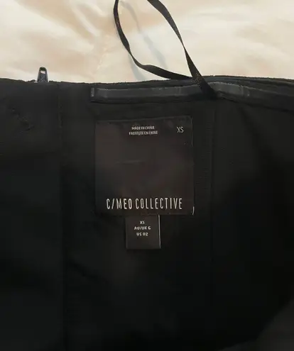 C/MEO COLLECTIVE Black Peplum Strapless Top NWOT XS