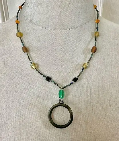 Green open circle beaded pendant necklace