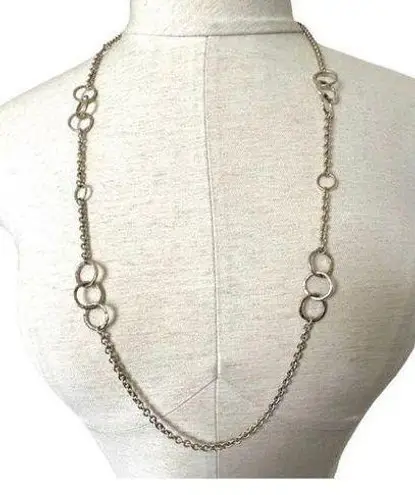 Long silver tone necklace with circles
