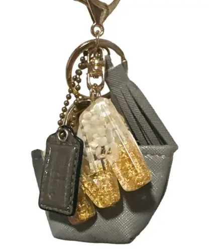 Coach NEW Bag Charm including a small  Bag Tag