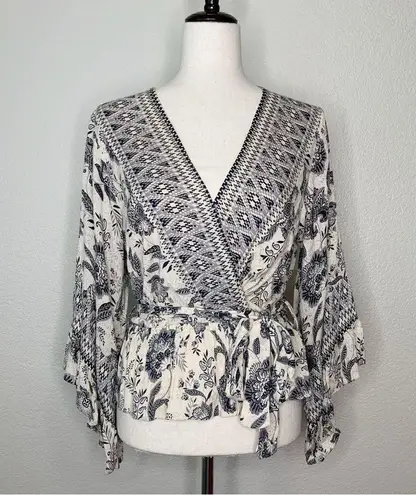 Angie  Size Small Floral Surplice Top