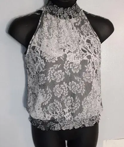 B. Wear black and white lace halter tank