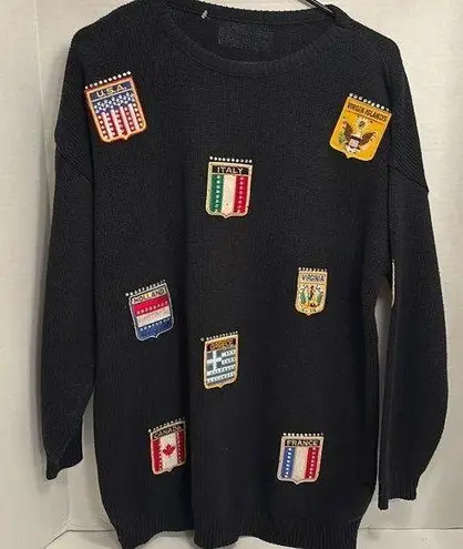 BLACK SWEATER…WITH PATCHES OF PLACES AROUND THE WORLD
NO TAGS COULD BE
VINTAGE Size undefined