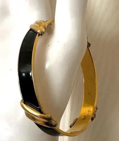 Monet black and gold tone bangle bracelet