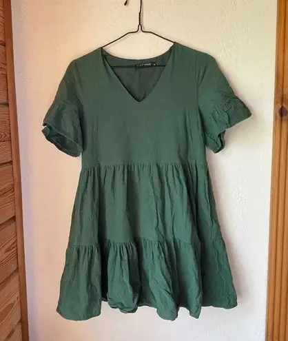 Fancyinn V neck short sleeve green dress with pockets size Medium
