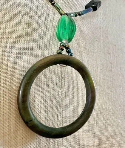 Green open circle beaded pendant necklace