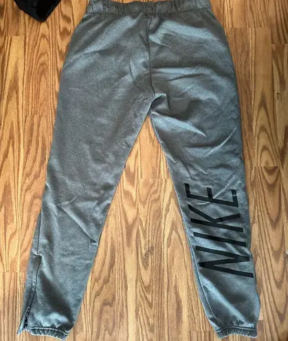 Nike  dri fit ogger pants. Zipper ankles. Size XS. Could be unisex