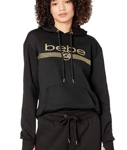 Bebe NWT  Black and Gold Glitter Logo Long Sleeve Pullover Hoodie Size Small