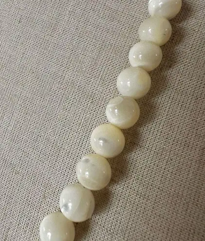 Karla Jordan mother of pearl cream and blue asymmetrical necklace