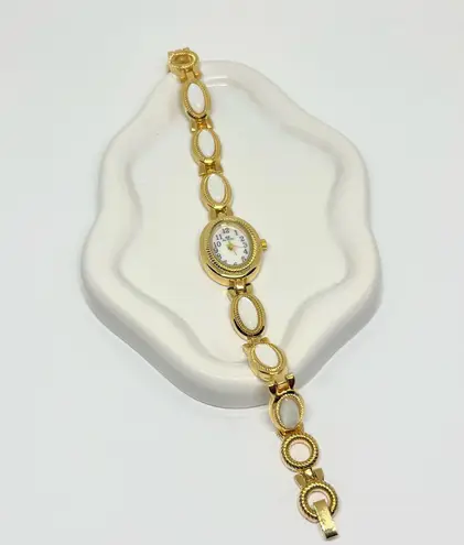 Gold plated dainty vintage style white stone watch