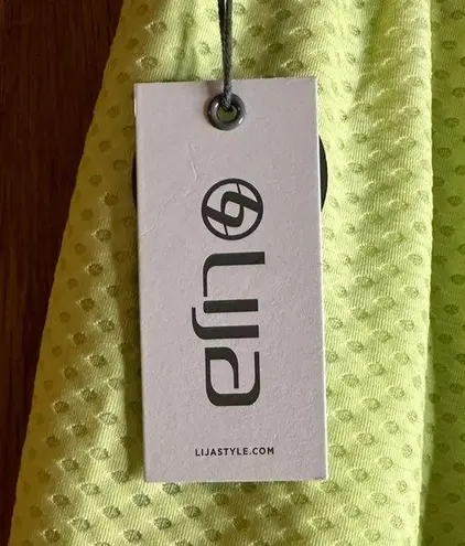 LIJA “Can’t be Tamed” NWT Mesh Circle Slit Skort in Celery yellow/green Yellow Size L