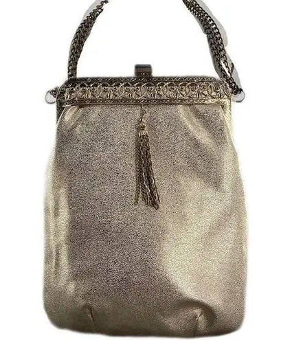 Vintage gold shimmering faux leather glam handbag with tassel. Gold
