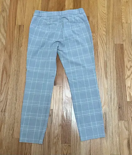 Banana Republic The  Woman’s Dress Pants in size 4 and Gray Glen Plaid are designed for a formal and dressy occasion. Made of cotton with a mid-rise and flat front, these slim-fit pants feature a straight leg style and button accents. thumbnail 7