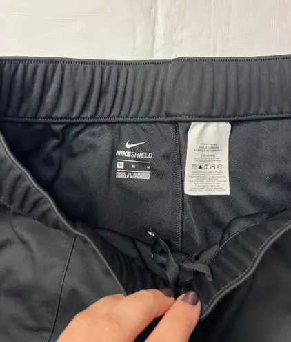 Nike NSW Shield Dri-Fit Tech Black Jogger Tech Pants