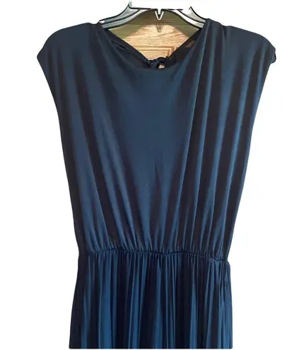 Kimberly Elegant Black Sleeveless jumpsuit tie in back elastic waist size Med.