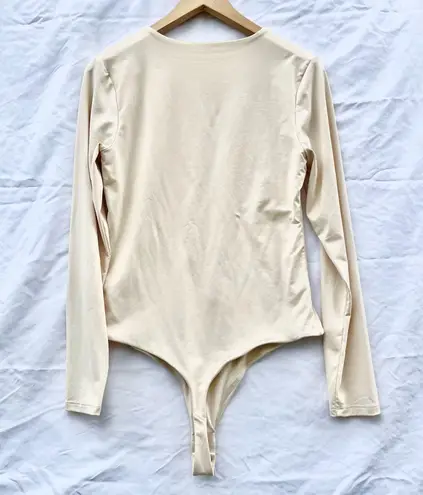 NUUDS | LARGE LONG SLEEVE CREWNECK BODYSUIT IN STONE