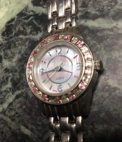 Pink jeweled watch