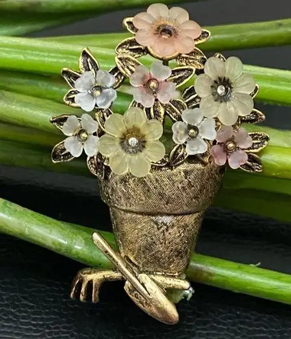 LIA Signed Pot of Flowers with Garden Tools Gold