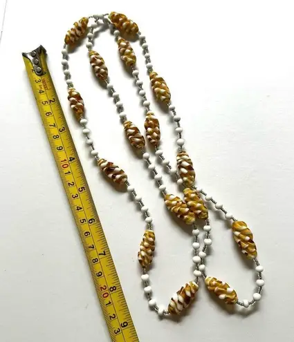 White and yellow swirl long beaded necklace