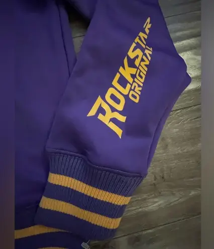 Rockstar Original Jacket size Small women’s purple and yellow cold shoulder