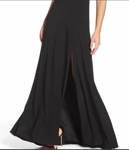 Women size small long black dress with small train bust and waist mesh detail