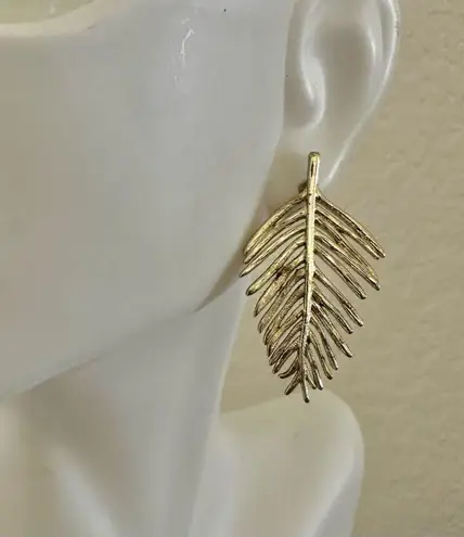 Gold tone palm leaf post earrings