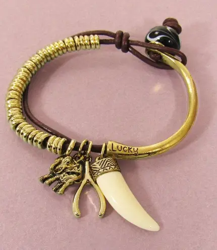 Bansri Lucky Charm Bracelet Gold Coil Leather Elephant, Wishbone & Tusk Pendant Brown