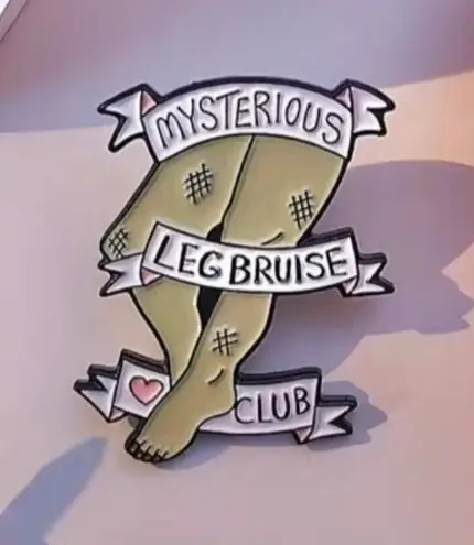 MYSTERIOUS LEG BRUISE CLUB Enamel Lapel Backpack Pin NEW